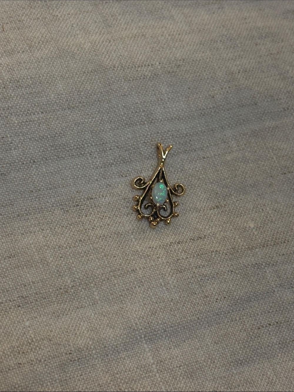 14k gold and opal pendant